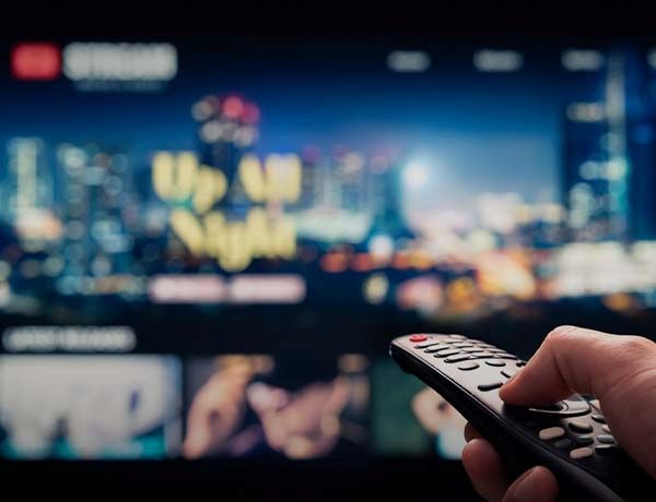 Remote control pointed at TV