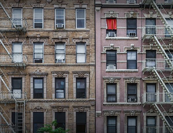Outside of a tenement apartment building